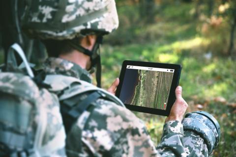 military guy with tablet